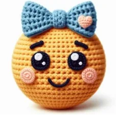 Crochet 3D emoji with a blue bow